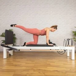 Align Pilates C8-S Pro White Pilates Reformer -Fitness Equipment Store img 24 ap c8sl womanside opti