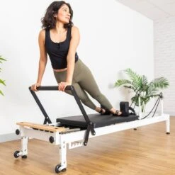 Align Pilates R8-Pro Pilates Reformer In White -Fitness Equipment Store img 24 ap papreformerr8w woman opti